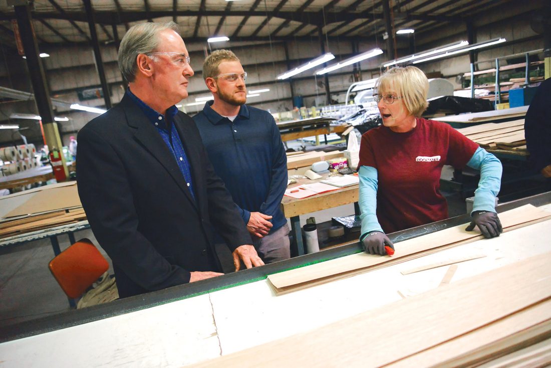 Rep. John Joyce discusses veneer grading and production at Edgemate's headquarters.
